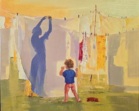 Sunrise XII: a small child in a blue shirt facing a white sheet on the washing line with a woman’s shadow on it